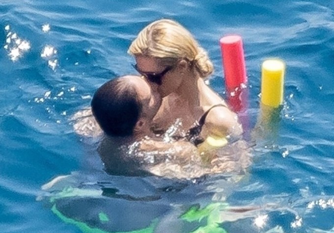 Paris Hilton & Carter Reum Pack On The PDA