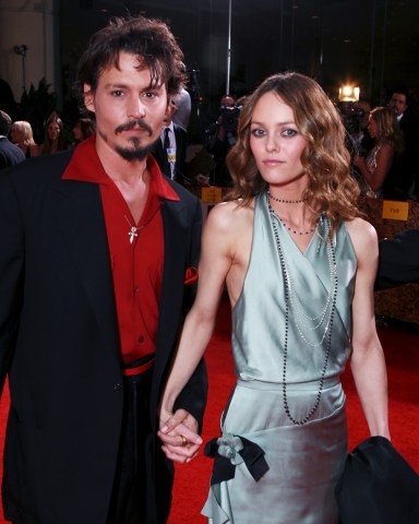 Johnny Depp and Vanessa Paradis
MOET AND CHANDON CHAMPAGNE RECEPTION FOR ARRIVALS AT THE 63RD ANNUAL GOLDEN GLOBE AWARDS, LOS ANGELES, AMERICA  - 16 JAN 2006