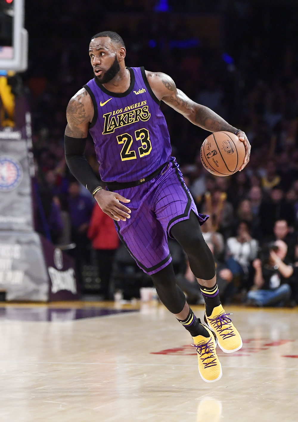 Los Angeles Lakers forward LeBron James dribbles during the second half of the team's NBA basketball game against the Portland Trail Blazers on Wednesday, Nov. 14, 2018, in Los Angeles. The Lakers won 126-117. (AP Photo/Mark J. Terrill)