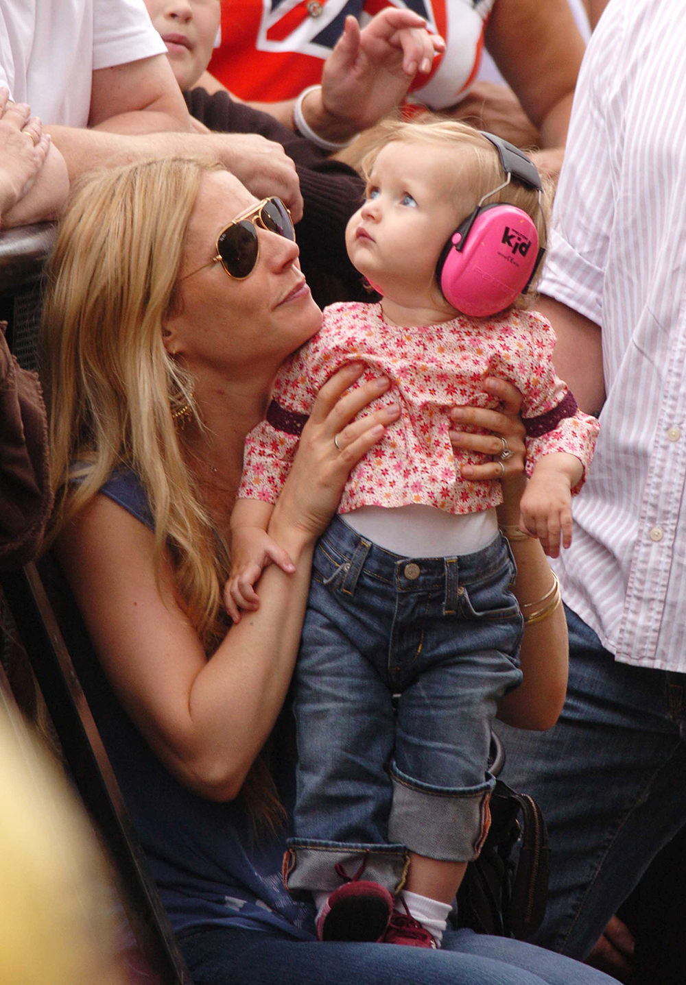 Live8 Concert in Hyde Park Gwyneth Paltrow and Her Daughter Apple Listening Tothe Opening of the Show and to Coldplay Whos Lead Singer Chris Martin is Apple's Father
Gwyneth Paltrow - 02 Jul 2005