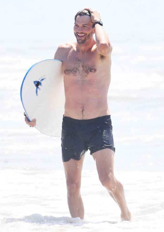 Ashton Kutcher Boogie Boards Shirtless