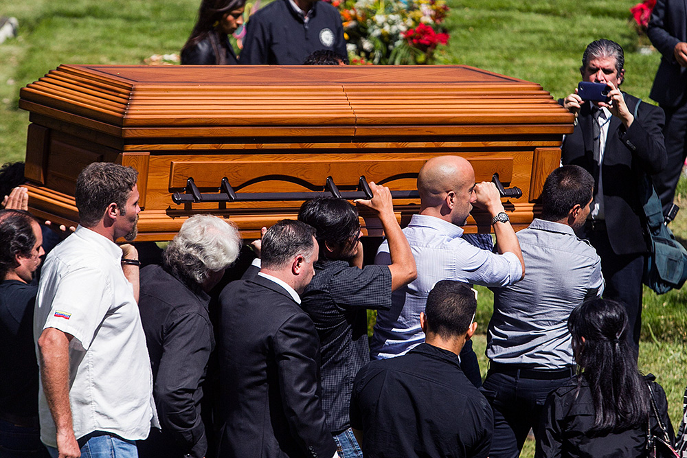 People Carry the Coffin of Henry Thomas Berry the Husband of Former Venezuelan Actress Monica Spear During Their Funeral at Cementerio Del Este in Caracas Venezuela 10 January 2014 Venezuelan Authorities Have Announced They Are Looking For Another Four Suspects in the Homicide Case of Spear and Berry Venezuela Caracas
Venezuela Violence Actress and Husband Killed - Jan 2014
