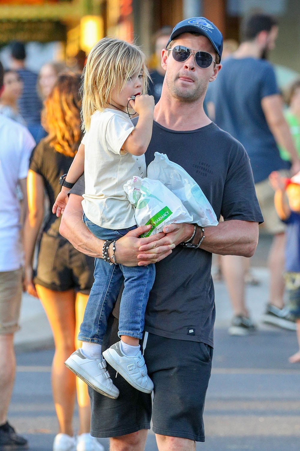 Chris Hemsworth and wife Elsa Pataky take a stroll in Byron Bay with the kids