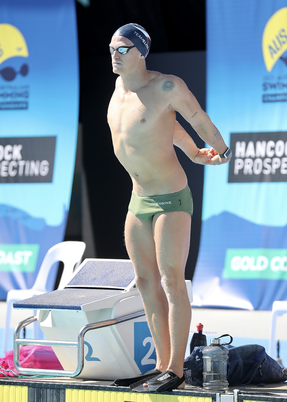 *EXCLUSIVE* Gold Coast, AUSTRALIA  - *PREMIUM-EXCLUSIVE*  - Cody Simpson fools around with swimmer friend Emily Seebohm poolside on the Gold Coast. The popstar is preparing to compete in the Australian National Swimming Championships this week. Cody was seen chatting with his trainer, Michael Bohl  and joking around with Olympic swimmer Emily Seebohm. Cody sported a pair of tiny green swim shorts that showed off his athletic build.

Pictured: Cody Simpson

BACKGRID USA 14 APRIL 2021 

BYLINE MUST READ: Backgrid AU / BACKGRID

USA: +1 310 798 9111 / usasales@backgrid.com

UK: +44 208 344 2007 / uksales@backgrid.com

*UK Clients - Pictures Containing Children
Please Pixelate Face Prior To Publication*