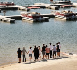 Cast members, including Heather Morris, from the TV Show "Glee" and friends held hands as they shouted "Say her name - Naya" as they gathered on the Lake Piru boat launch Monday morning just as Ventura County Sheriff's Search and Rescue dive team located a body Monday morning in Lake Piru as the search continued for 33-year-old "Glee" actress Naya Rivera after her 4-year-old son was found alone on a boat she rented last Wednesday. Rivera rented the pontoon boat and had been swimming with her son who was the last one to see her before she went missing. The boy got back into the boat after a swim but his mother did not follow. Lake Piru on Monday
Cast members from the show "Glee" and friends gathered Monday morning at the boat launch as Ventura County Sheriff's Search and Rescue dive team located a body Monday morning in Lake Piru as the search continued for actress Naya Rivera after her 4-year-old