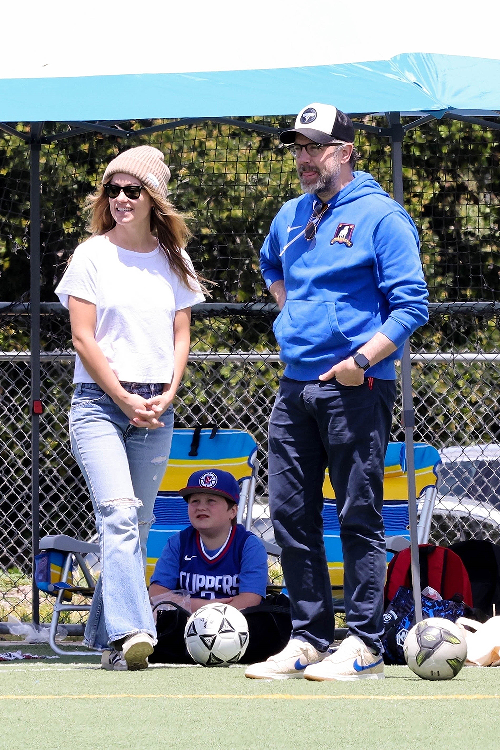 Jason Sudeikis and Olivia Wilde share a hug at their son's soccer match in LA!