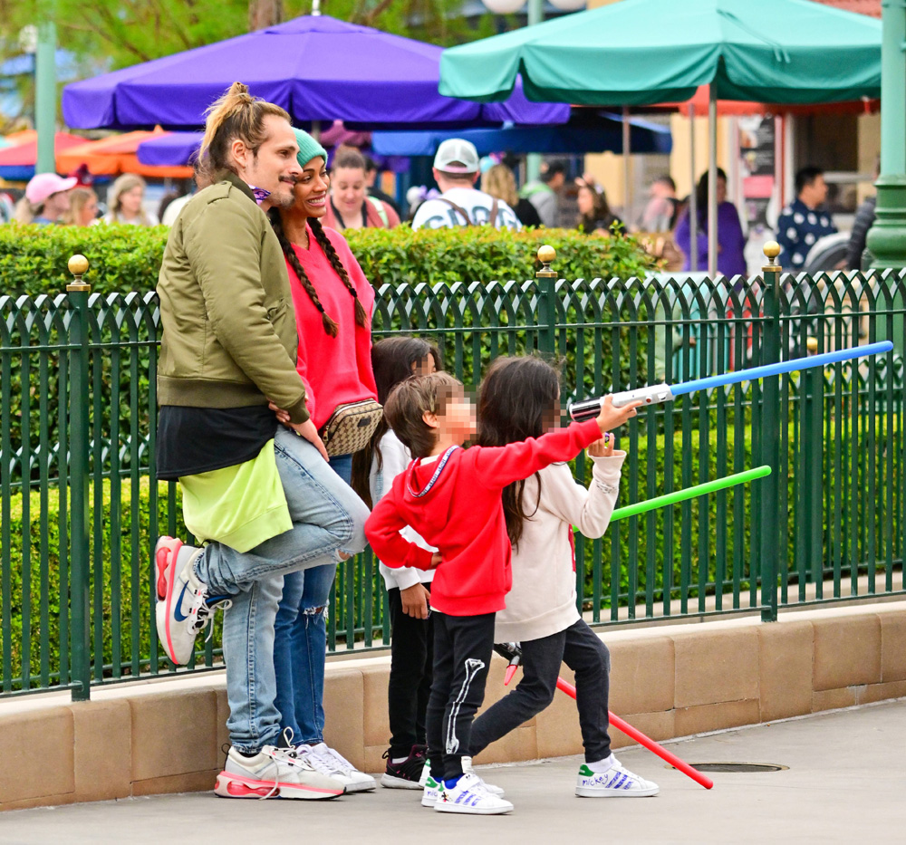 EXCLUSIVE: Zoe Saldana and her husband Marco Perego Saldana enjoy a fun day at Disneyland