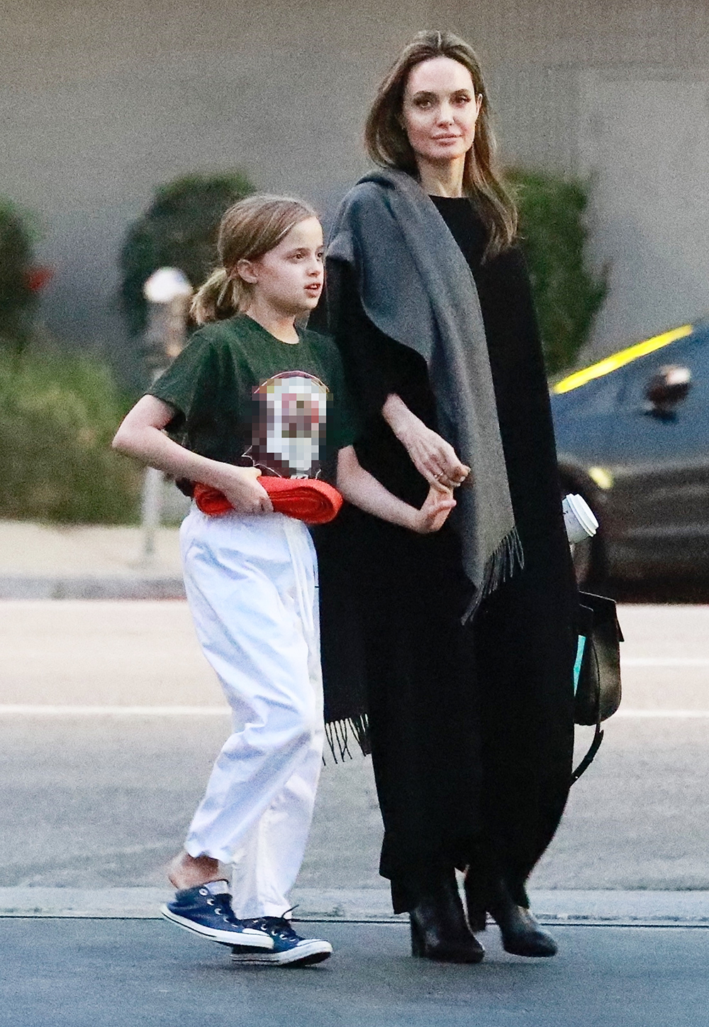 Los Angeles, CA  - Angelina Jolie and daughter Vivienne Marcheline pictured exiting a martial arts gym in L.A. this afternoon. The young red belt was chatting away while holding hands with her mom. Jolie wore a black maxi dress with a gray scarf over her shoulder and black leather booties.

Pictured: Angelina Jolie, Vivienne Marcheline Jolie-Pitt

BACKGRID USA 28 JANUARY 2019 

USA: +1 310 798 9111 / usasales@backgrid.com

UK: +44 208 344 2007 / uksales@backgrid.com

*UK Clients - Pictures Containing Children
Please Pixelate Face Prior To Publication*