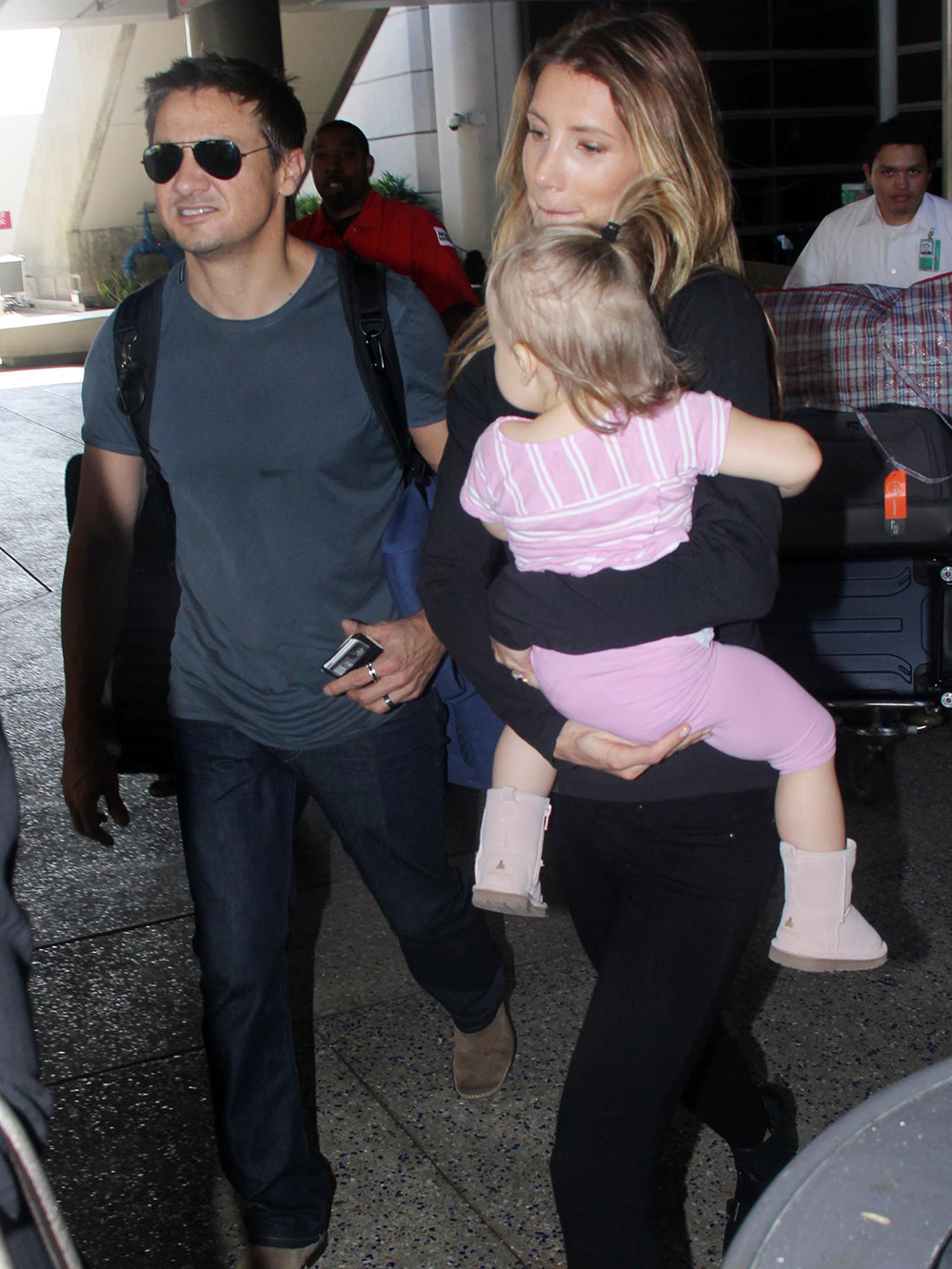 EXC JEREMY RENNER AND FAMILY ARRIVING AT LAX