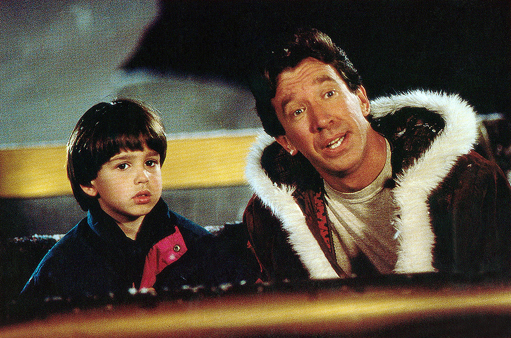 THE SANTA CLAUSE, from left: Eric Lloyd, Tim Allen, 1994, © Buena Vista/courtesy Everett Collection