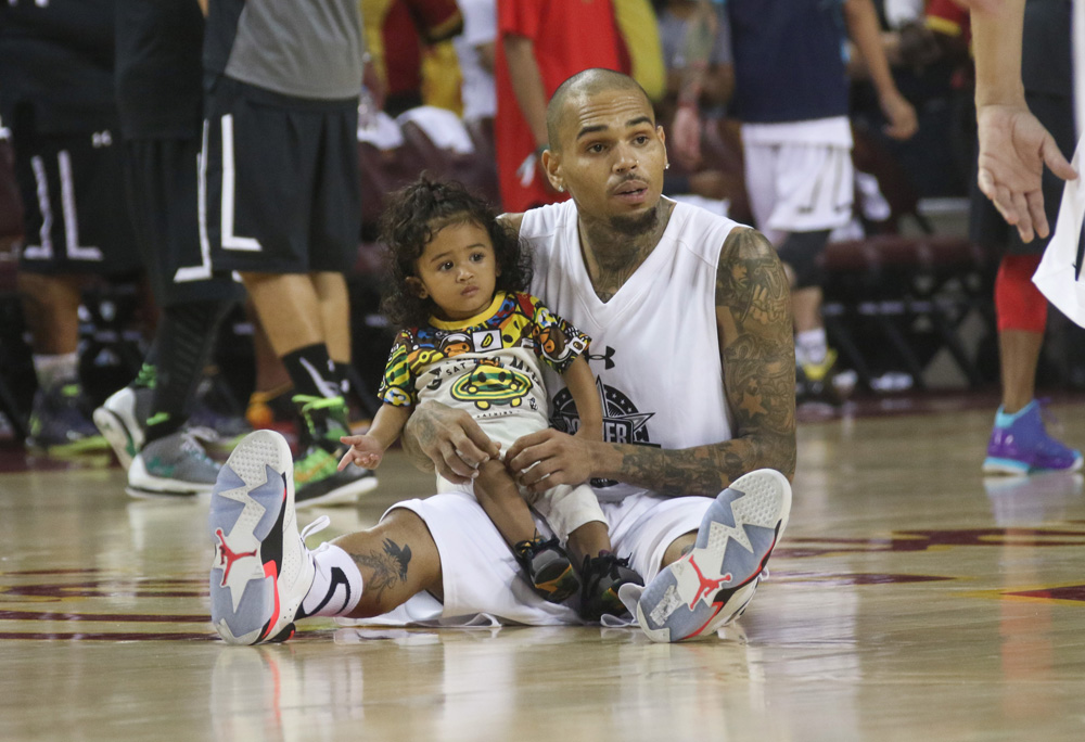 Chris Brown and Royalty at charity basketball