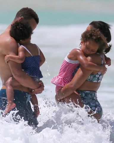 Kailua, HI  - *EXCLUSIVE*  - NBA superstar Stephen Curry and his family were seen enjoying a lovely day on the beach in Kailua, Hawaii. Steph enjoyed a couple of beers before going for a swim with his wife Ayesha and their two daughters Ryan and Riley.Pictured: Stephen Curry, Ayesha Curry, Ryan Curry, Riley CurryBACKGRID USA 22 JUNE 2017 USA: +1 310 798 9111 / usasales@backgrid.comUK: +44 208 344 2007 / uksales@backgrid.com*UK Clients - Pictures Containing ChildrenPlease Pixelate Face Prior To Publication*