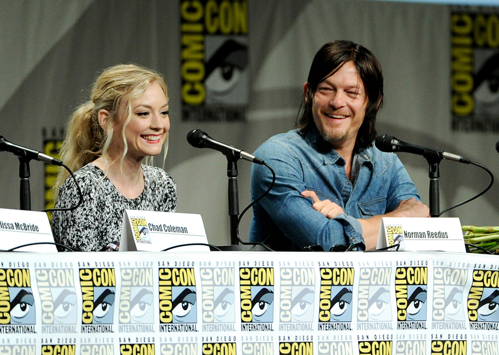 Emily Kinney, left, and Norman Reedus attend "The Walking Dead" panel on Day 2 of Comic-Con International, in San Diego. Looking on from left are Chad Coleman and Emily Kinney
2014 Comic-Con - "The Walking Dead" Panel, San Diego, USA - 25 Jul 2014