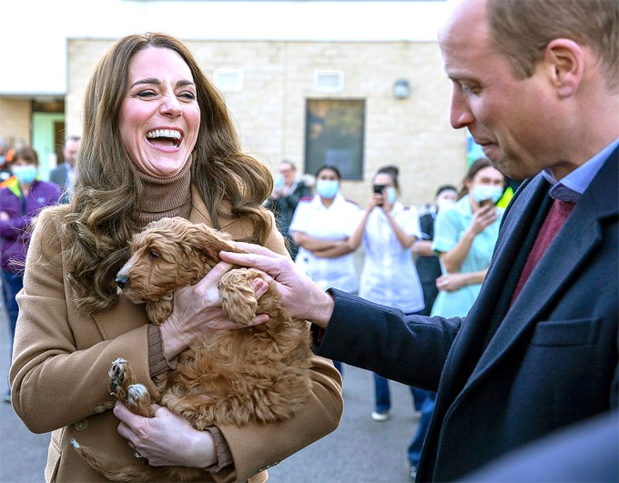 Kate Middleton Cradles A Puppy With Prince William