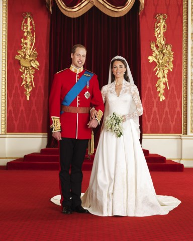 Editorial use only
Mandatory Credit: Photo by Hugo Burnand/Clarence House/REX/Shutterstock (1310831b)
Prince William Prince William with his bride Catherine the Catherine Duchess of Cambridge
Official Portraits of the wedding of Prince William and Catherine Middleton, London, Britain - 29 Apr 2011
Official Royal Wedding pictures released by Clarence House show the bride and groom in the throne room at Buckingham Palace with Bridesmaids and Page boys along with other members of the Royal Family