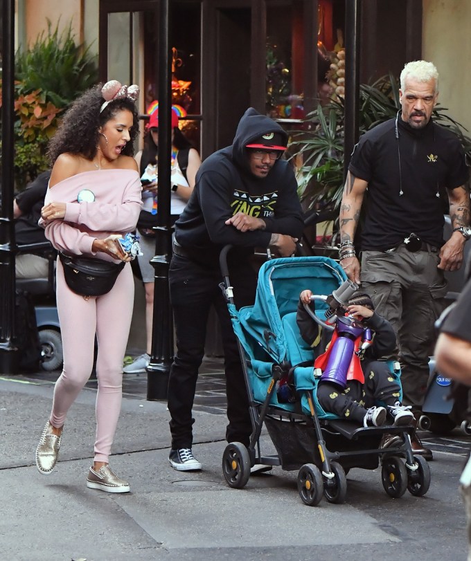 Nick Cannon, Brittany Bell, and their Son Golden Take a Stroll Around Disneyland