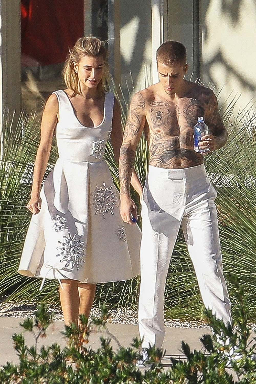 Hollywood, CA  - The fun continues for Justin Bieber and Hailey Baldwin as they don all white outfits for the next part of their photoshoot, which looked a bit reminiscent of wedding attire. In between takes, Justin could be seen entertaining Hailey and the crew by playing on his guitar.

Pictured: Justin Bieber, Hailey Baldwin

BACKGRID USA 4 DECEMBER 2018 

USA: +1 310 798 9111 / usasales@backgrid.com

UK: +44 208 344 2007 / uksales@backgrid.com

*UK Clients - Pictures Containing Children
Please Pixelate Face Prior To Publication*