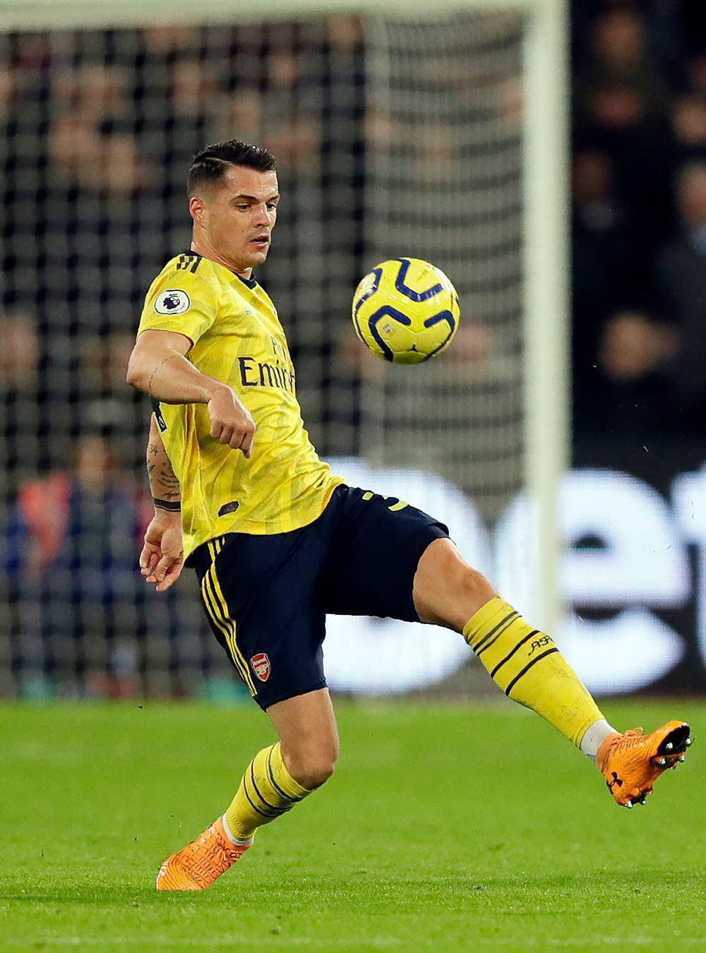 Arsenal's Granit Xhaka kicks the ball during the English Premier League soccer match between West Ham Utd and Arsenal at the London Stadium in London
Soccer Premier League, London, United Kingdom - 09 Dec 2019