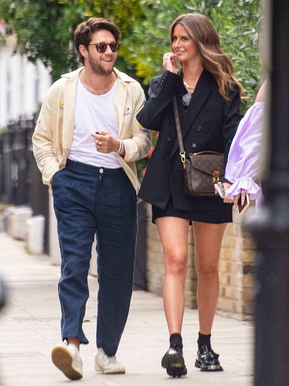 London, UNITED KINGDOM  - *EXCLUSIVE*  - 1D star Niall Horan looks loved up with girlfriend Amelia as he takes her dad and mum out for Fathers Day lunch. The pair looked happy as they strolled arm in arm through Knightsbridge with her mum and dad and friend to Hawksmoor restaurant. Two surprised women did a double-take as they recognized the One Direction heartthrob. Niall wearing a £430 linen Bode shirt adorned with yachts and Navy linen trousers with white detailing, Amelia was dressed in a black blazer and black mini skirt with a Louis Vuitton bag and Sandro iron platform loafers priced £345. Amelia who left the restaurant with her parents first was seen posing up against a large door for a photo whilst waiting for Niall who was last to leave. The couple has been dating for 2 years and is said to be serious.

Pictured: Niall Horan Amelia Woolley Paul Woolley

BACKGRID USA 20 JUNE 2022 

USA: +1 310 798 9111 / usasales@backgrid.com

UK: +44 208 344 2007 / uksales@backgrid.com

*UK Clients - Pictures Containing Children
Please Pixelate Face Prior To Publication*