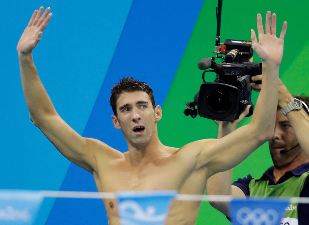 United States Michael Phelps acknowledges the crowd after his team won gold in the men's 4 x 100-meter medley relay final during the swimming competitions at the 2016 Summer Olympics, in Rio de Janeiro, Brazil
Rio Olympics Swimming, Rio de Janeiro, Brazil - 13 Aug 2016