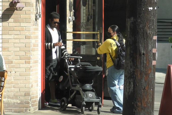 Usher and girlfriend Jen Goicoechea