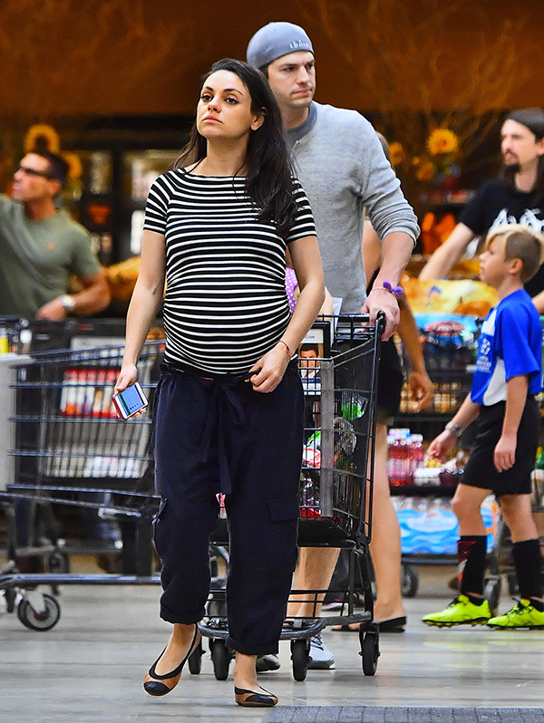 mila-kunis-looks-ready-to-pop-while-shopping-with-ashton-kutcher-ftr