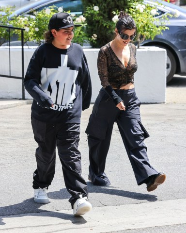 Calabasas, CA - *EXCLUSIVE* - Kourtney Kardashian is having special mother-son time with her growing son Mason Disick. The pair hit up Shibuya sushi for lunch in Calabasas followed by ice cream for dessert.Pictured: Kourtney Kardashian, Mason Disick BACKGRID USA 2 JUNE 2022 USA: +1 310 798 9111 / usasales@backgrid.comUK: +44 208 344 2007 / uksales@backgrid.com*UK Clients - Pictures Containing ChildrenPlease Pixelate Face Prior To Publication*