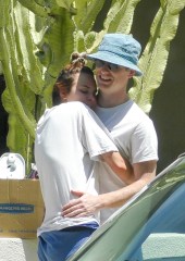 Los Angeles, CA  - *EXCLUSIVE*  - Tallulah Willis and fiance Dillon Buss hug and share a kiss outside their new home as the movers work around them. Tallulah, wearing blue shorts and an overized grey t-shirt also picks up a food delivery for her and fiance Dilon.

Pictured: Tellulah Willis, Dillion Buss

BACKGRID USA 5 MAY 2021 

USA: +1 310 798 9111 / usasales@backgrid.com

UK: +44 208 344 2007 / uksales@backgrid.com

*UK Clients - Pictures Containing Children
Please Pixelate Face Prior To Publication*