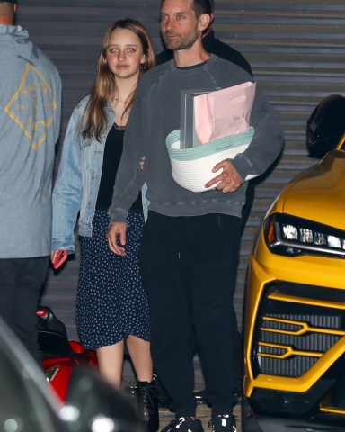 Malibu, CA  - *EXCLUSIVE*  - One big happy family! Actor Tobey Maguire displays a healthy co-parenting relationship as he celebrates his ex-wife Jennifer Mayer on Mother's Day with their kids at Nobu in Malibu.

Pictured: Tobey Maguire, Jennifer Mayer

BACKGRID USA 8 MAY 2022 

USA: +1 310 798 9111 / usasales@backgrid.com

UK: +44 208 344 2007 / uksales@backgrid.com

*UK Clients - Pictures Containing Children
Please Pixelate Face Prior To Publication*