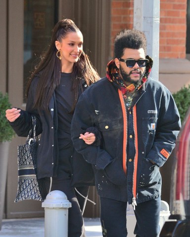 New York, NY - Model Bella Hadid and boyfriend The Weeknd are seen leaving their apartment in New York. The pair who walked arm in arm as they headed to their waiting SUV were on their way to the airport to catch a flight out of the city. Bella was sporting a Dior Handbag with her name on the side.Pictured: Bella Hadid, The WeekndBACKGRID USA 1 FEBRUARY 2019 USA: +1 310 798 9111 / usasales@backgrid.comUK: +44 208 344 2007 / uksales@backgrid.com*UK Clients - Pictures Containing ChildrenPlease Pixelate Face Prior To Publication*