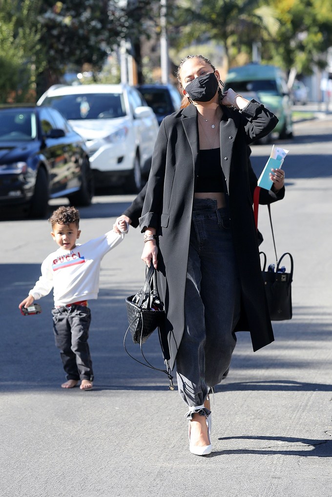 Chrissy Teigen & Son Miles Holding Hands