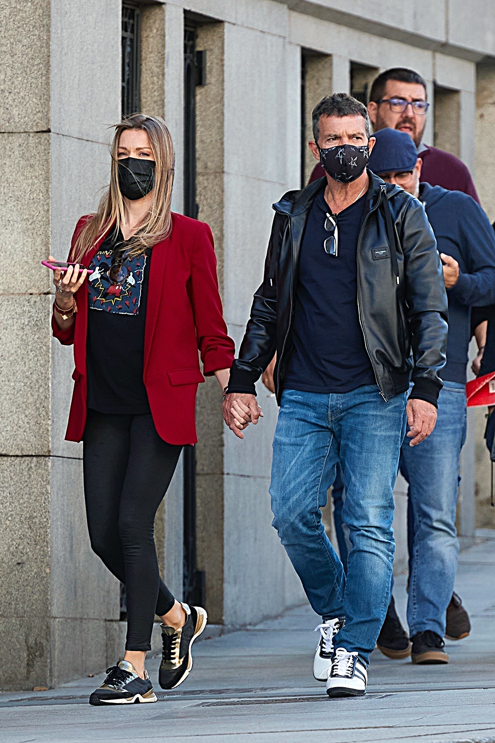 *EXCLUSIVE* Antonio Banderas and girlfriend Nicole Kimpel stroll hand-in-hand while in Madrid