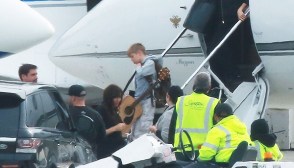 Brad Pitt Helps Kids Play Guitar