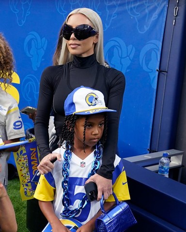 Kim Kardashian, wearing sunglasses, stands near the field after the Los Angeles Rams played an NFL football game against the Dallas Cowboys, in Inglewood, Calif
Cowboys Rams Football, Inglewood, United States - 09 Oct 2022