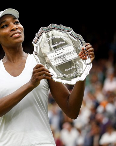 Venus Williams of USA with the runners up trophy following her loss in the Ladies Final
Wimbledon 2017, Day 12, All England Lawn Tennis Club, London UK, 15 July 2017