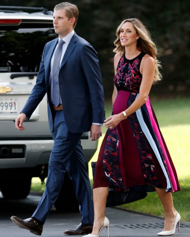 Eric Trump, Lara Trump Eric Trump, and his wife Lara Trump, walk to Marine One on the South Lawn of the White House, in Washington. President Donald Trump is en route to Huntington, W.Va
Trump, Washington, USA - 03 Aug 2017