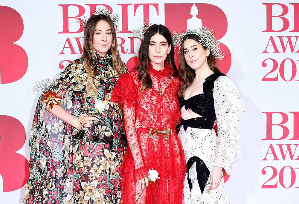 Brit Awards 2018 - Arrivals - London. HAIM's Este Haim, Danielle Haim and Alana Haim attending the Brit Awards at the O2 Arena, London. Picture date: Wednesday February 21, 2018. See PA story SHOWBIZ Brits. Photo credit should read: Ian West/PA Wire URN:35139333