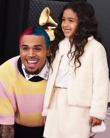 Chris Brown, left, and Royalty Brown arrive at the 62nd annual Grammy Awards at the Staples Center on Sunday, Jan. 26, 2020, in Los Angeles. (Photo by Jordan Strauss/Invision/AP)