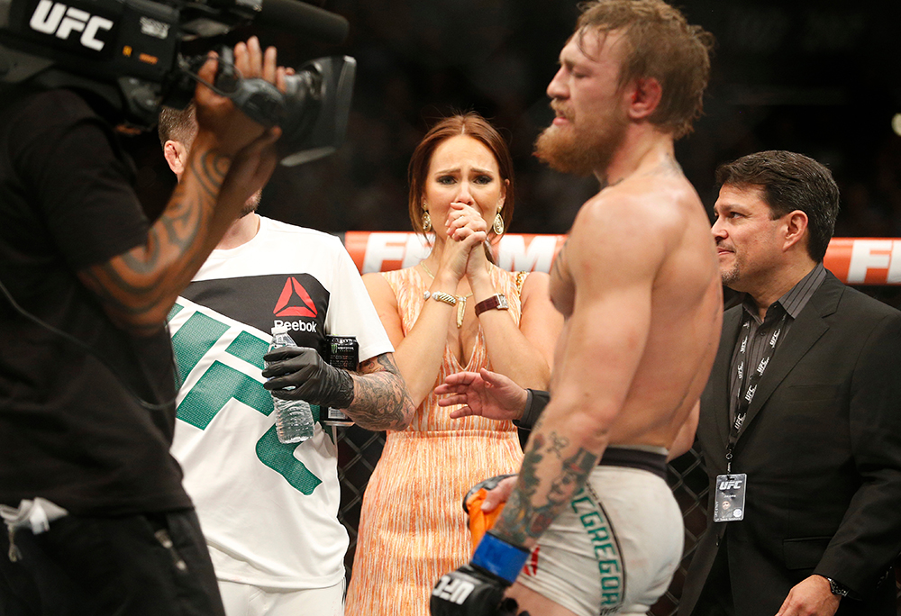 Conor McGregor's girlfriend Dee Devlin reacts after McGregor defeated Chad Mendes during their interim featherweight title mixed martial arts bout at UFC 189, in Las Vegas
UFC 189 Mixed Martial Arts, Las Vegas, USA