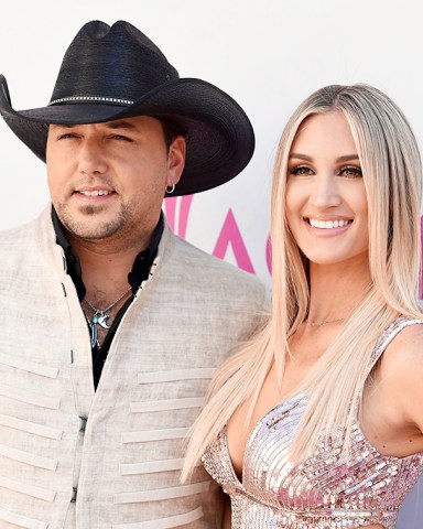 Jason Aldean, left, and Brittany Kerr arrive at the 52nd annual Academy of Country Music Awards at the T-Mobile Arena in Las Vegas. Aldean announced on May 8, 2017, that he and Kerr are expecting their first child together
People Jason Aldean, Las Vegas, USA - 2 Apr 2017