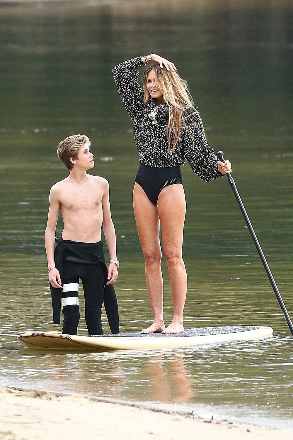 *EXCLUSIVE* Elle Macpherson and her sons get playful during a beach photoshoot