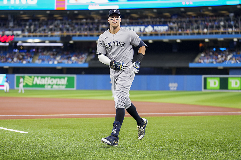 New York Yankees center fielder Aaron Judge heads to the dugout before facing the Toronto Blue Jays at Rogers Centre in Toronto, Canada on Tuesday, September 27, 2022. Aaron Judge is one home run away from tying the American League and Yankees club record with 61 home runs set by Roger Maris.New York Yankees v Toronto Blue Jays, MLB, Toronto, Ontario, Canada - 25 Sep 2022