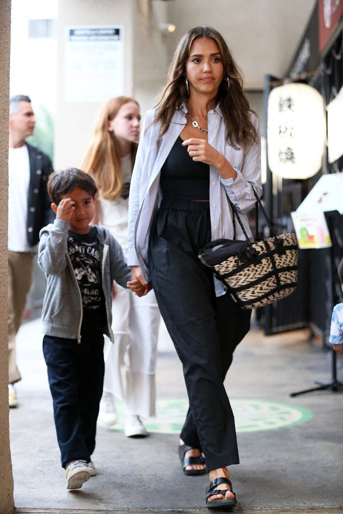 Jessica Alba and Hayes hold hands