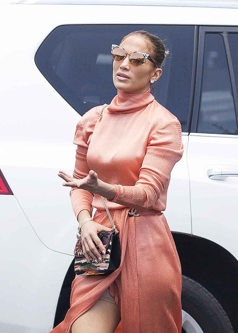 Jennifer Lopez spotted wearing Spanx as she attends her twins graduation and Alex Rodriguez and ex Marc Anthony in Miami. Lopez wore shape wear under a revealing salmon colored Chanel dress as she made her way to the graduation ceremony of Max and Emme.Pictured: Jennifer Lopez,Alex RodriguezRef: SPL5095986 050619 NON-EXCLUSIVEPicture by: SplashNews.comSplash News and PicturesLos Angeles: 310-821-2666New York: 212-619-2666London: 0207 644 7656Milan: 02 4399 8577photodesk@splashnews.comWorld Rights