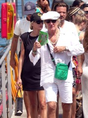 Capri, ITALY  - *EXCLUSIVE*  - Scottish rock and roll star Rod Stewart looks like a character out of 'Pirates of the Caribbean' as he's seen rocking some pearls while out with son Sean and daughter Kimberley on their holiday in Capri. **SHOT ON 08/06/22**

Pictured: Rod Stewart, Sean Stewart, Kimberly Stewart

BACKGRID USA 9 AUGUST 2022 

USA: +1 310 798 9111 / usasales@backgrid.com

UK: +44 208 344 2007 / uksales@backgrid.com

*UK Clients - Pictures Containing Children
Please Pixelate Face Prior To Publication*