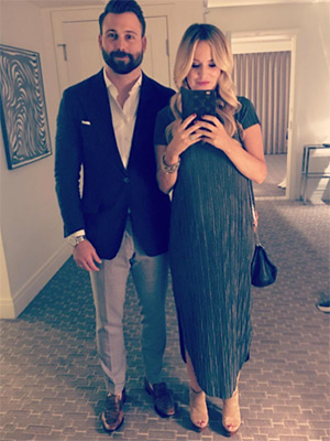Pregnant Emily Maynard with her husband Tyler Johnson