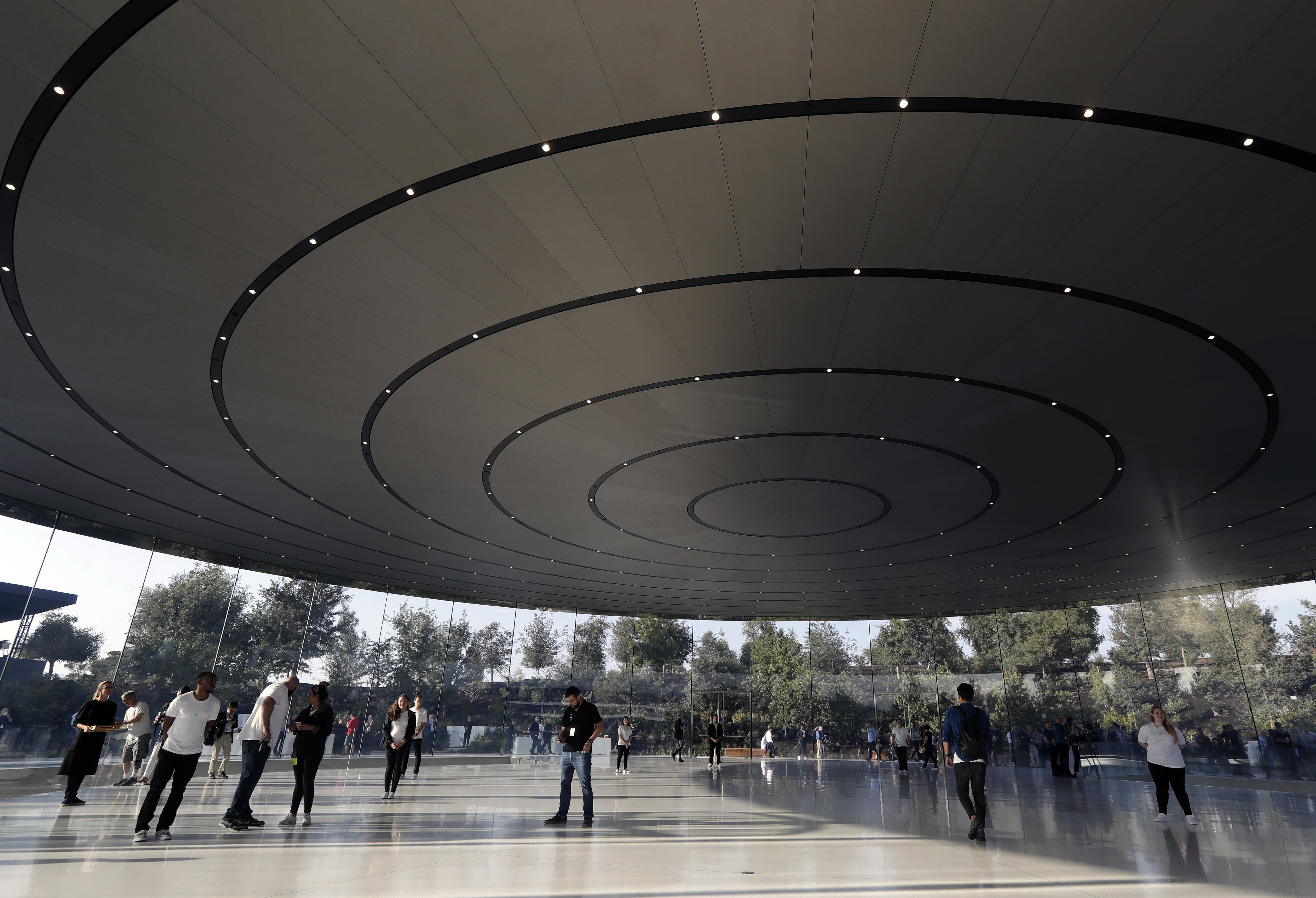 People arrive for a new product announcement at the Steve Jobs Theater on the new Apple campus, in Cupertino, Calif
Apple Event, Cupertino, USA - 12 Sep 2017