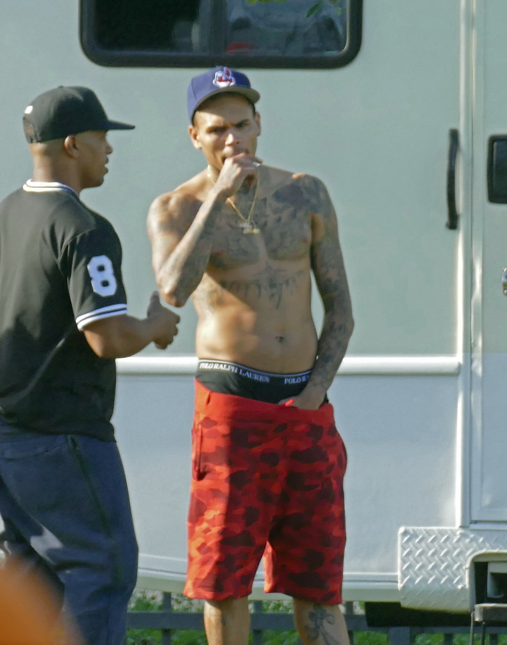 American hip-hop / r&b / pop singer Chris Brown was pictured shirtless while on break from filming a music video with DJ Khaled, August Alsina, Fetty Wap, and other artists, models, and friends. His regained fit body can be seen as he shed the extra weight that he put on a while back. His hand was also resting inside the crotch area of his shorts.

Pictured: Chris Brown
Ref: SPL1115927 020915 NON-EXCLUSIVE
Picture by: SplashNews.com

Splash News and Pictures
Los Angeles: 310-821-2666
New York: 212-619-2666
London: +44 (0)20 7644 7656
Berlin: +49 175 3764 166
photodesk@splashnews.com

World Rights