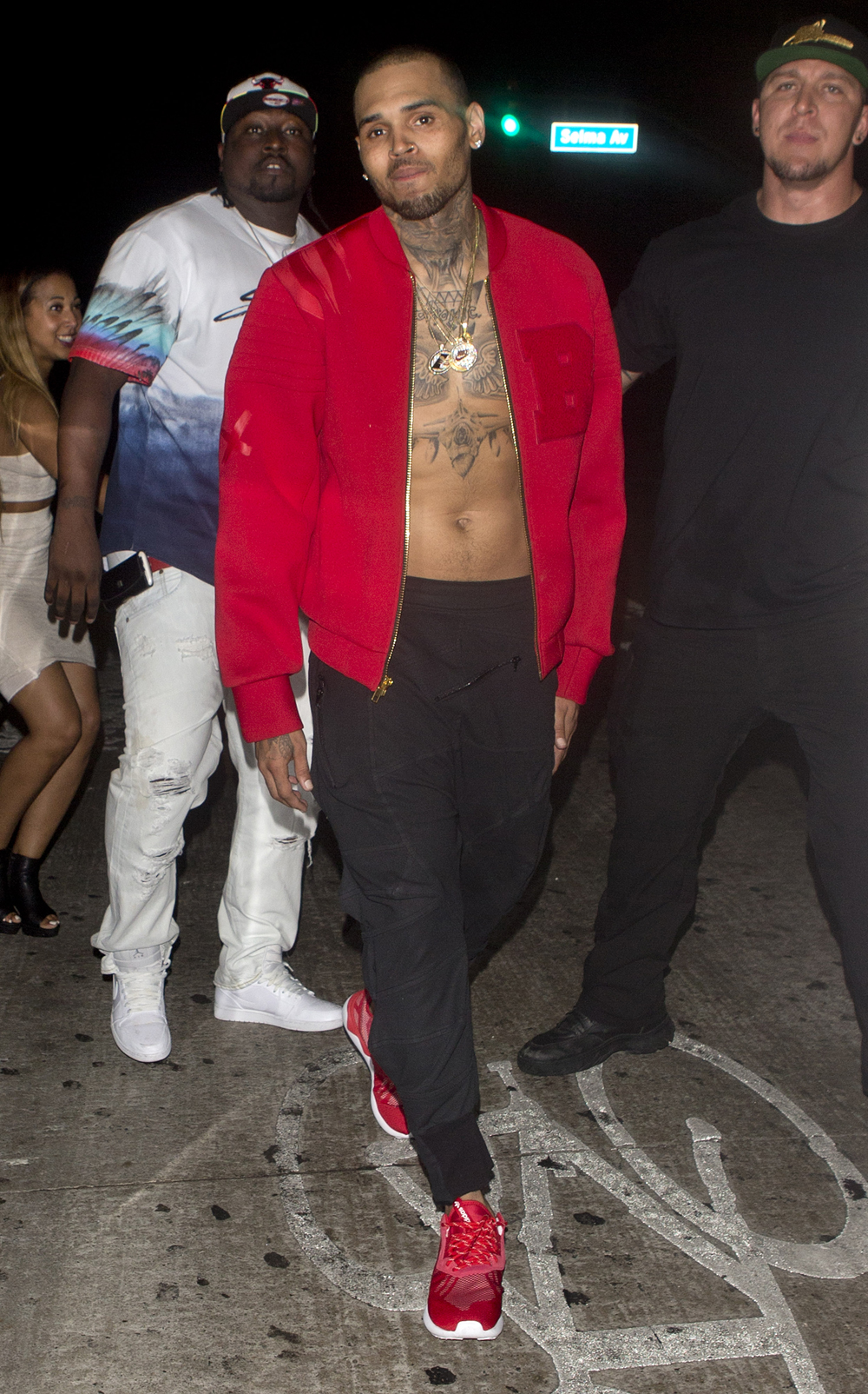 Chris Brown shirtless with just an open jacket seen leaving 'Argyle' Night Club in Hollywood, CA