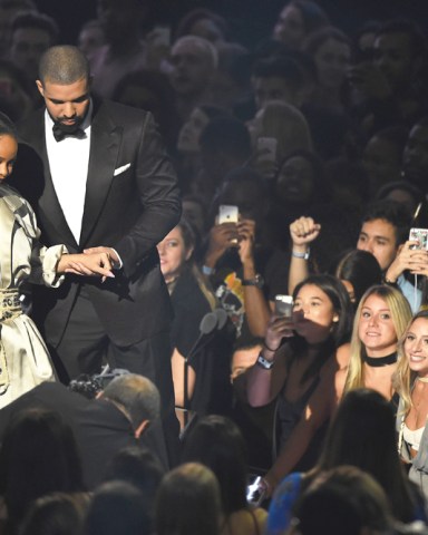 Rihanna, left, accepts the Michael Jackson Video Vanguard Award from Drake at the MTV Video Music Awards at Madison Square Garden, in New York
2016 MTV Video Music Awards - Show, New York, USA